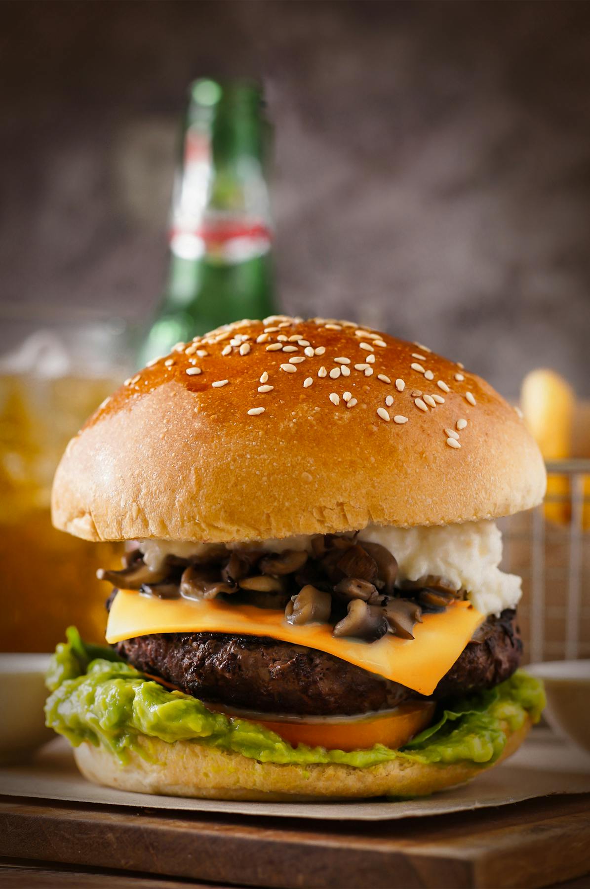 An experienced chef meticulously preparing burger patties in the kitchen.