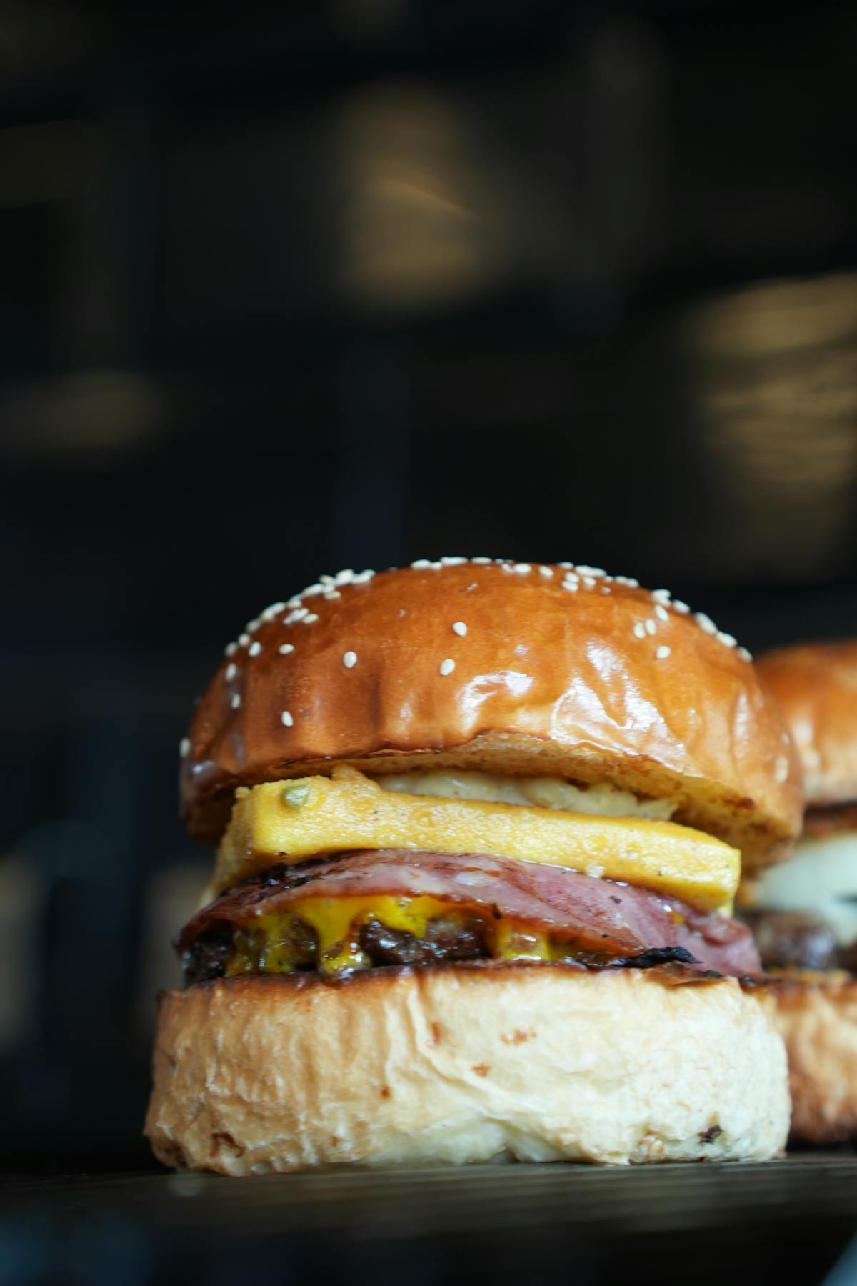 A cosy seating area in a restaurant with soft lighting and a welcoming atmosphere.